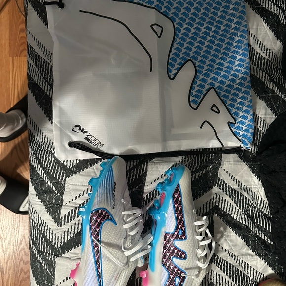 Nike Zoom Cleats with Blue and Pink Accents